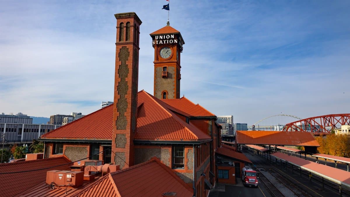 A scenic view of Union Station in Portland, Oregon, featuring its iconic architecture and railway tracks.