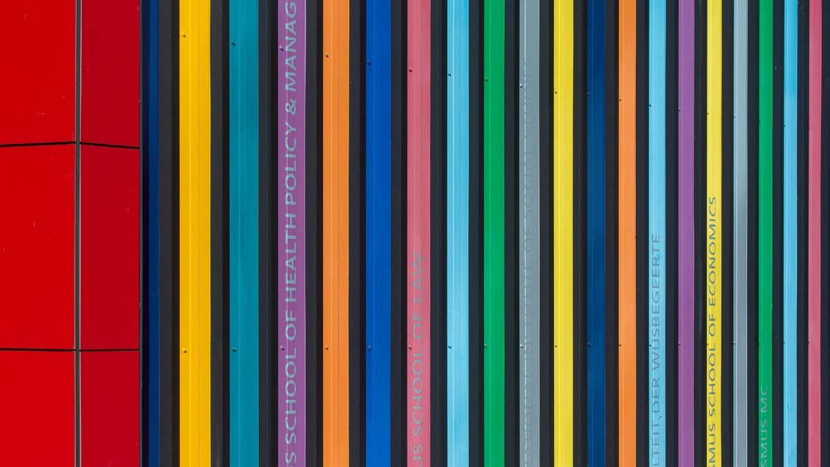 Vibrant striped facade of Erasmus University in Rotterdam, showcasing a modern architectural style.