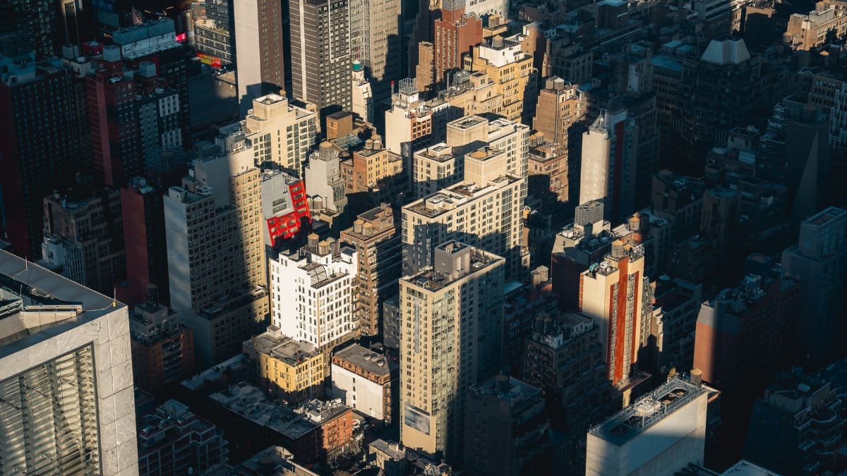 Captivating aerial shot of New York City's dense skyline, showcasing modern urban architecture.