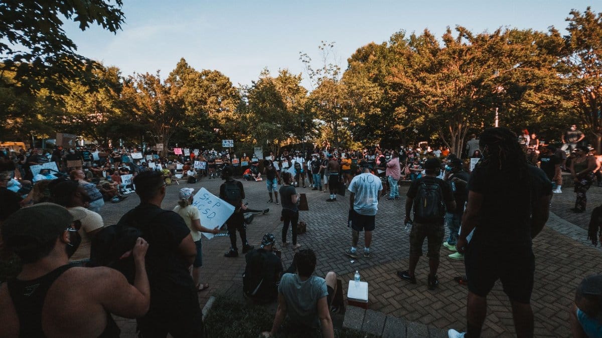 Multiethnic people gathering on square to protect rights of black people during black lives matter demonstration