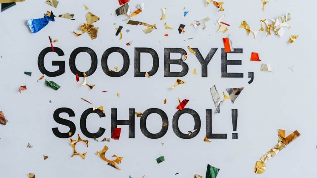 Colorful confetti surrounds a goodbye school message, celebrating graduation.