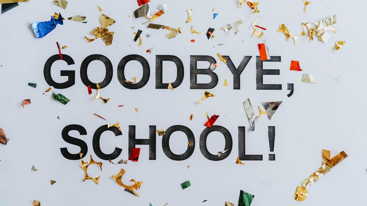 Colorful confetti surrounds a goodbye school message, celebrating graduation.