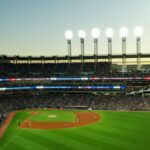 A vibrant twilight baseball game at Cleveland's Progressive Field, capturing the lively atmosphere.