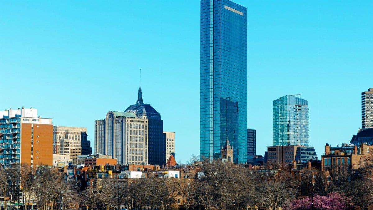 Stunning view of Boston's skyline featuring the iconic John Hancock Tower and modern architecture.