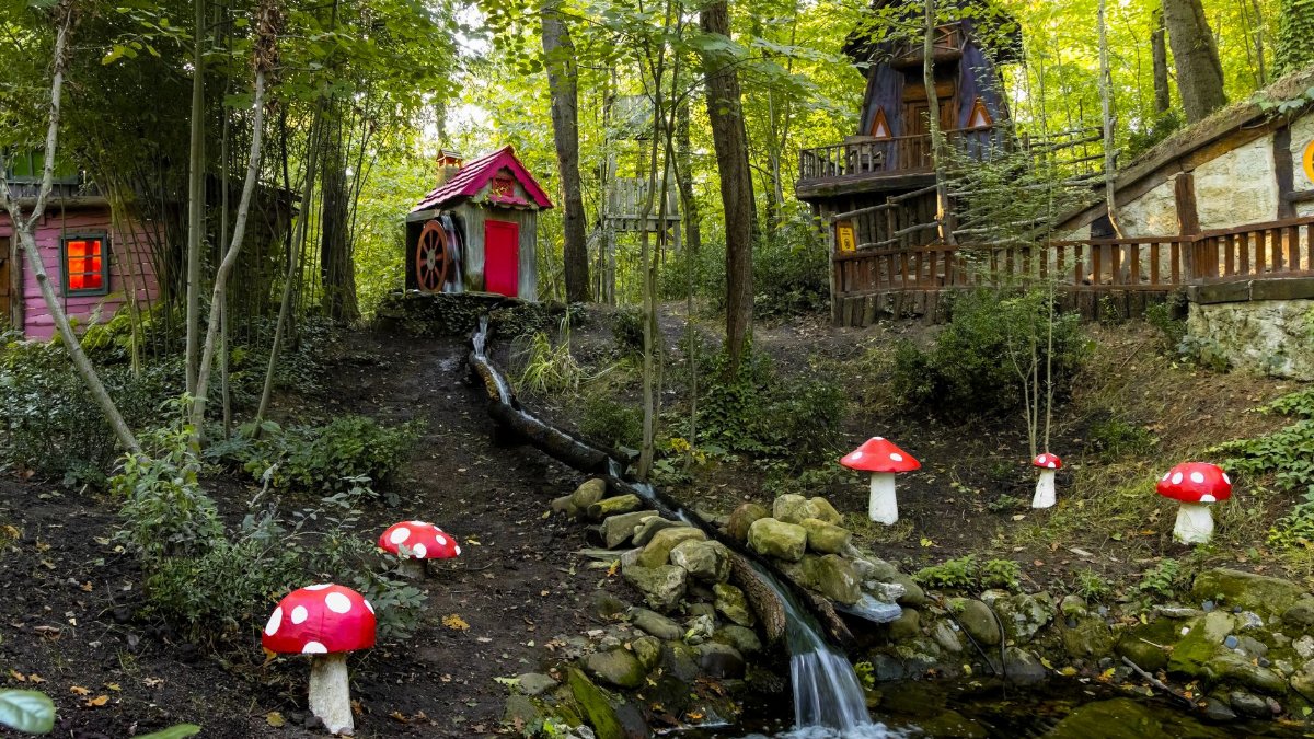 Whimsical scene of fairy tale houses in a lush forest in Kocaeli, Türkiye.