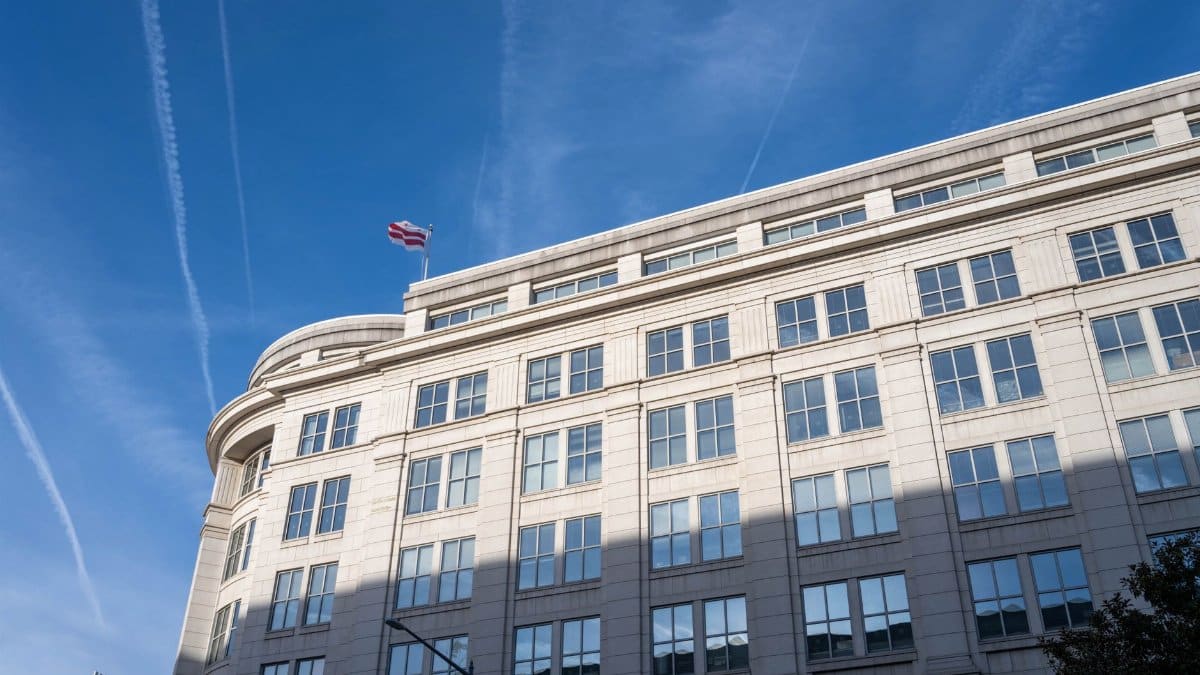 Elegant office building under a clear blue sky in Washington, D.C.