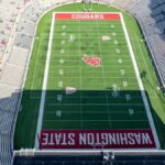Aerial shot of Washington State University's football stadium, beautifully capturing the green field and empty stands.