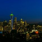 Spectacular view of Seattle skyline featuring the iconic Space Needle at night.