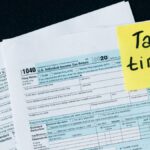 U.S. tax documents with a 'Tax time!' reminder, highlighting the importance of filing deadlines.