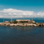 Stunning aerial shot of Alcatraz Island in San Francisco Bay, highlighting the historic prison and its surroundings.