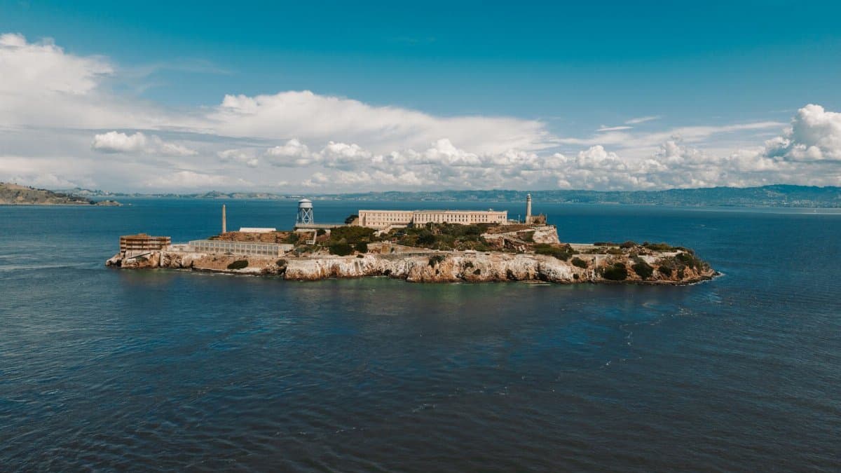 Stunning aerial shot of Alcatraz Island in San Francisco Bay, highlighting the historic prison and its surroundings.