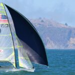 Dynamic sailboat racing event in San Francisco Bay, capturing thrilling action and picturesque scenery.