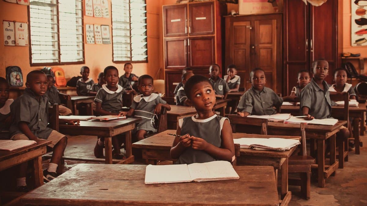 African children attentively participating in a classroom lesson, fostering education and learning.