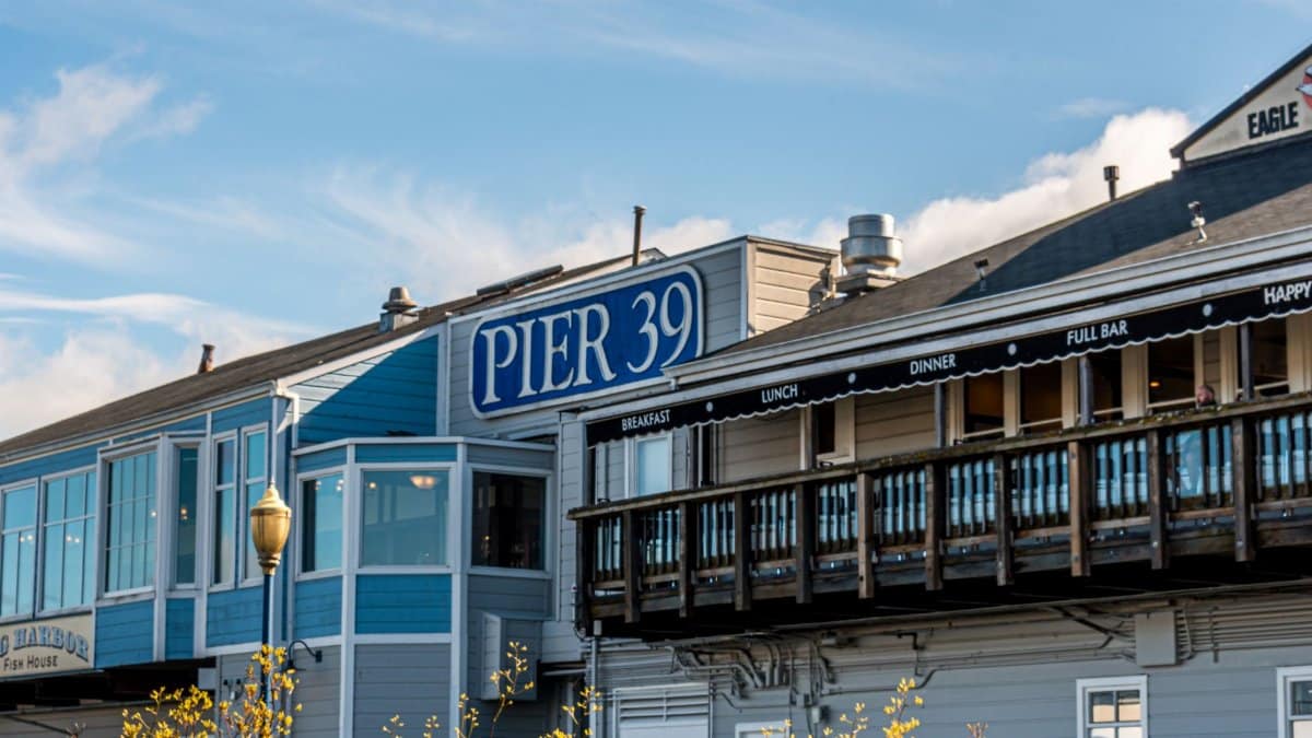 View of the famous Pier 39 in San Francisco, a popular tourist destination with dining and shopping options.