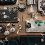 Aerial view of a vintage jewelry and antiques market display with various items for sale.