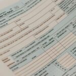 Detailed close-up image of a U.S. 1040 Individual Income Tax Return form, ideal for finance-related content.