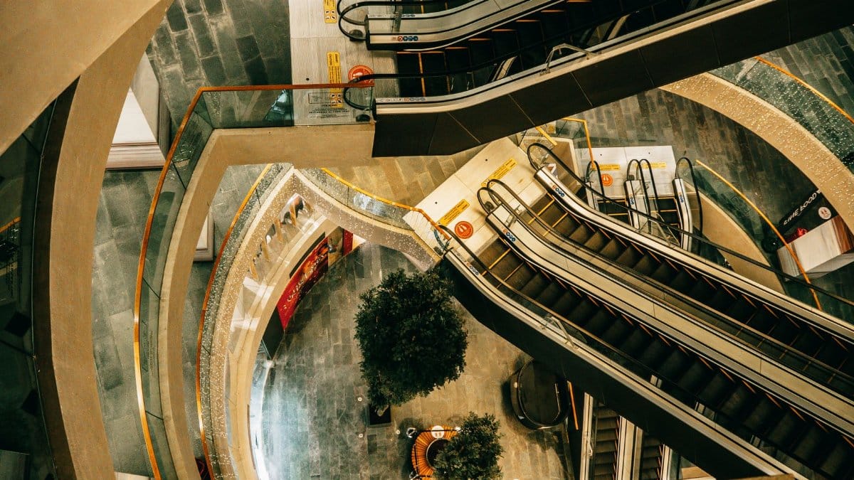 High angle view of escalators in a shopping mall in Istanbul, showcasing modern architecture.