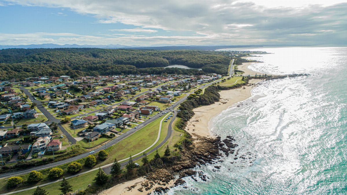 Explore the scenic beauty of Dalmeny, NSW with this stunning aerial view of its coastal landscape.