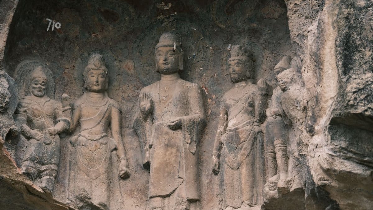 Historic Buddhist rock carvings showcasing ancient art and craftsmanship.