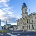 Oamaru's historic architecture and street scene with clear blue skies in New Zealand.