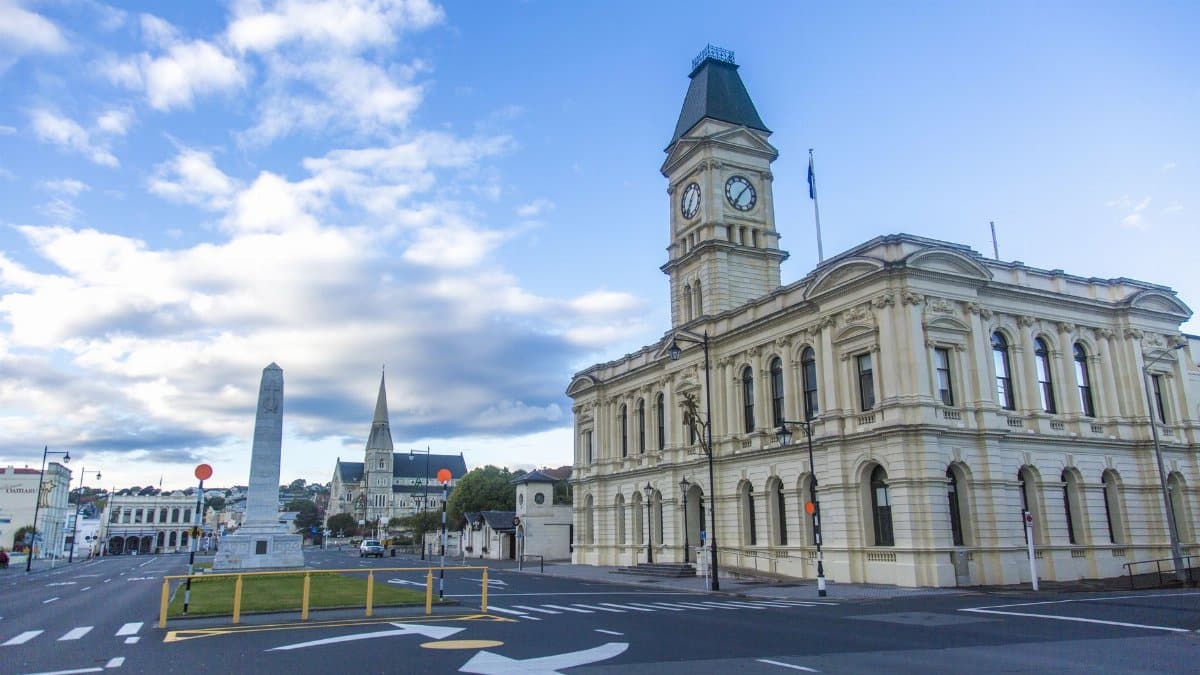 Oamaru's historic architecture and street scene with clear blue skies in New Zealand.
