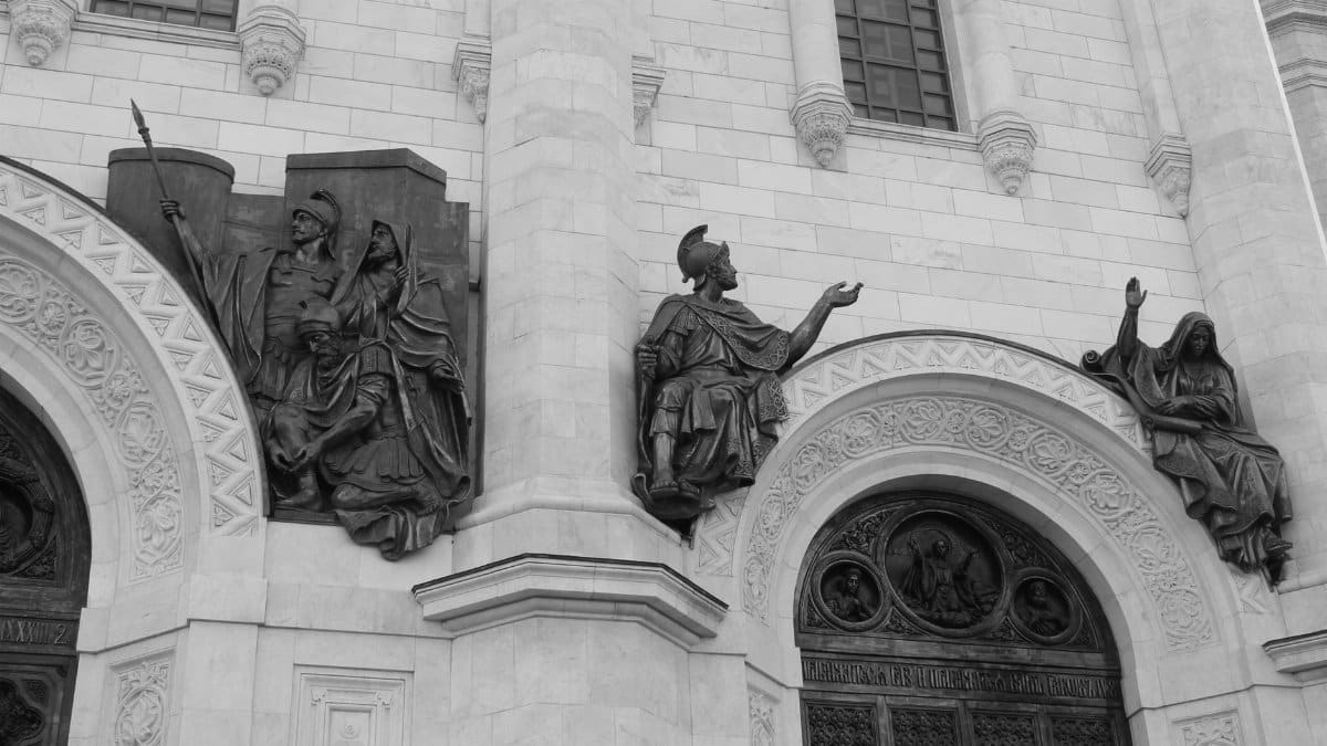Black and white view of Christ the Savior Cathedral's detailed facade in Moscow, Russia.