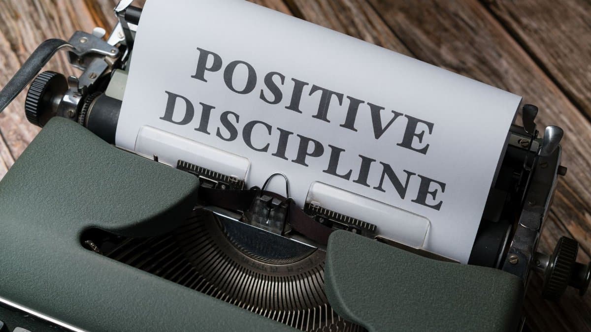 Vintage typewriter featuring the text 'Positive Discipline'. A classic representation of communication and education.