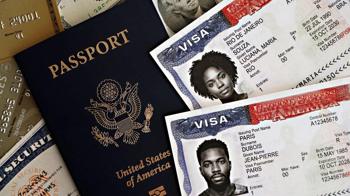 Close-up of a U.S. passport with visas and currency, symbolizing international travel and immigration.