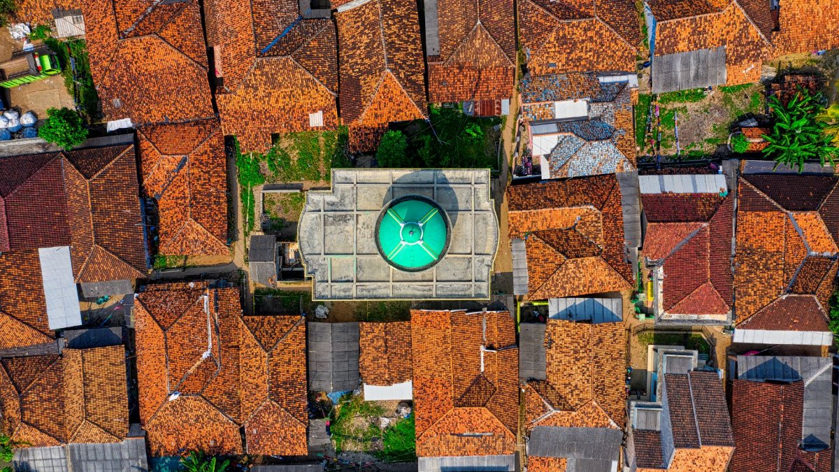 Drone view of rooftops and architectural patterns in Serang, Indonesia.