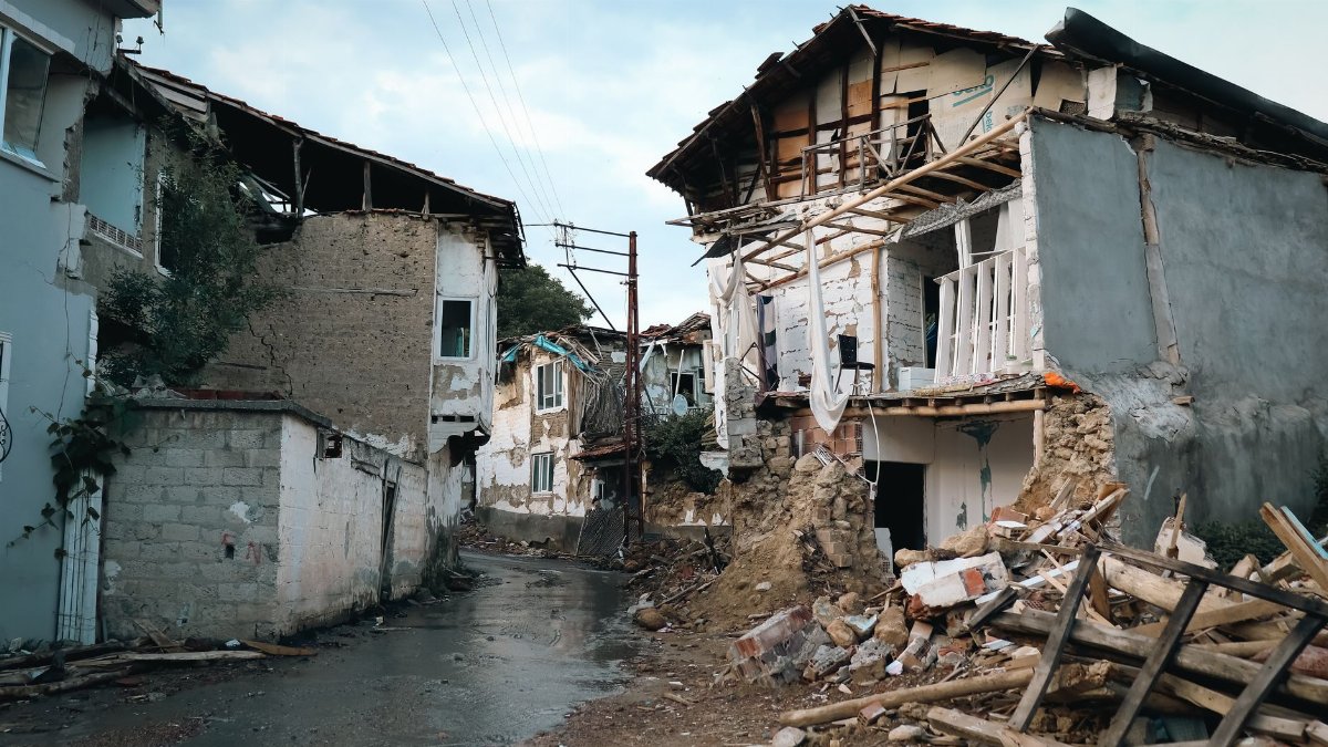 Destroyed buildings in an urban area after an earthquake.