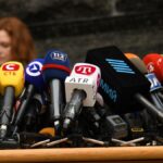 Various microphones setup at a press conference in Kyiv, Ukraine.