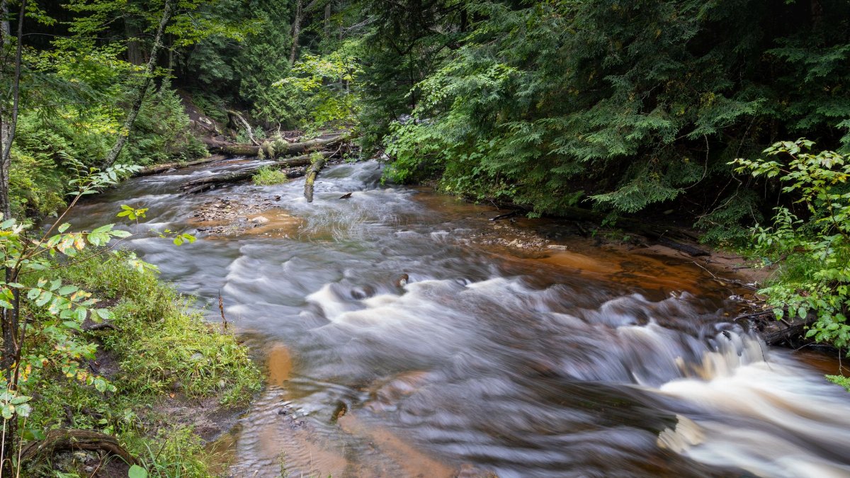 Capture of the serene flow of Hurricane River in Michigan's Upper Peninsula.