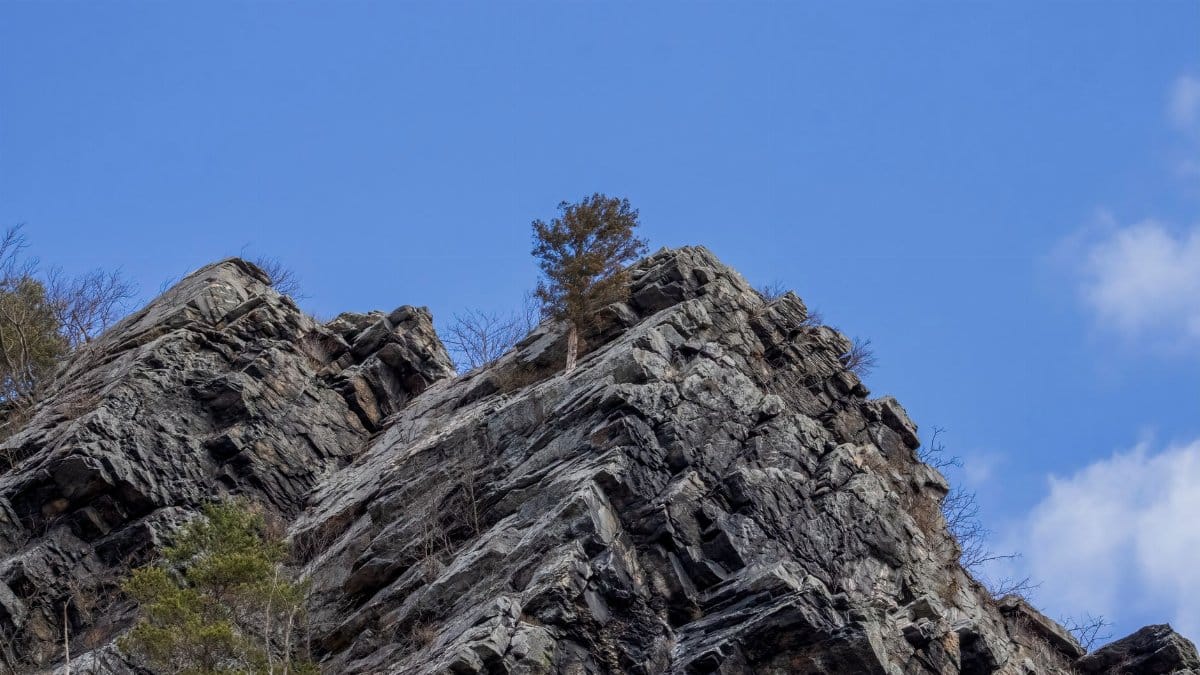 A striking view of rocky cliffs against a clear blue sky in Harpers Ferry, WV.