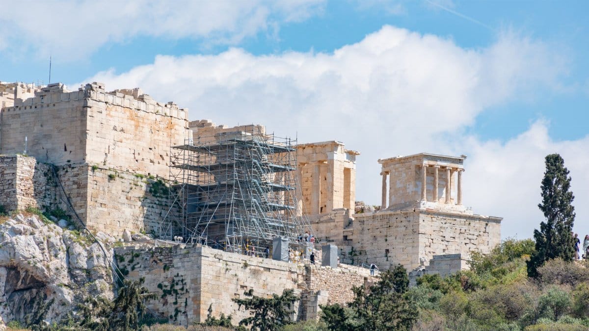 View of the Acropolis in Athens, showcasing ancient architecture and restoration efforts.