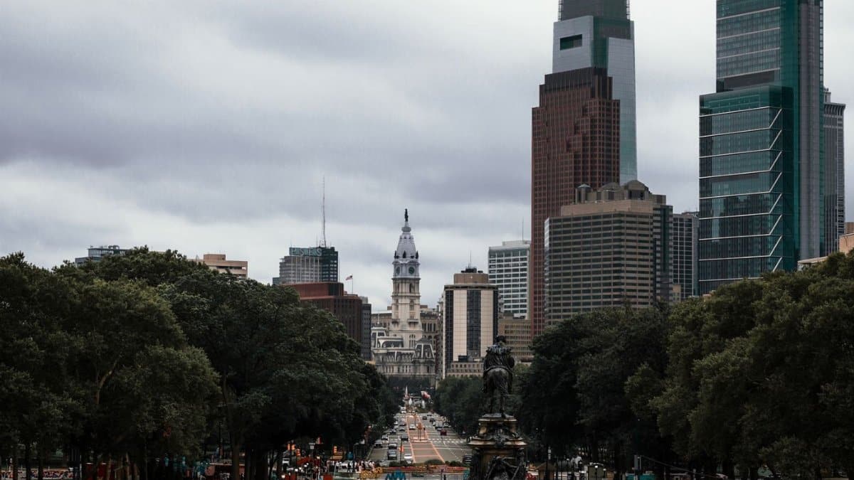 Vibrant view of Philadelphia's skyline featuring the iconic City Hall and surrounding skyscrapers.