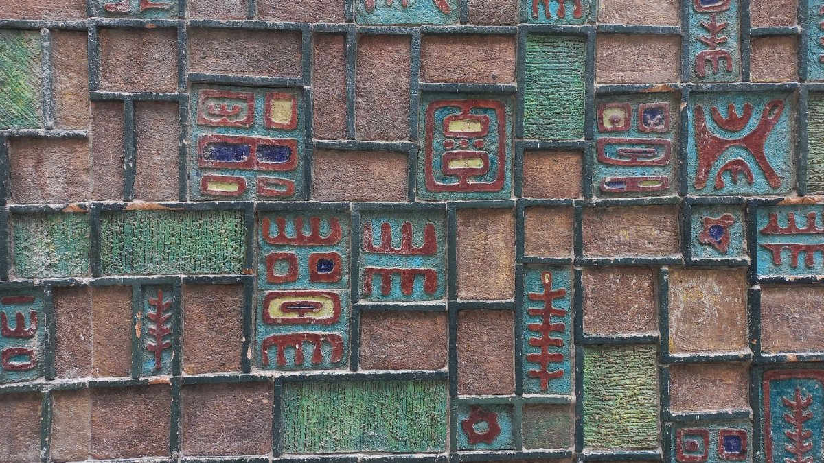 Intricate mosaic wall with geometric patterns located in İzmir, Türkiye.