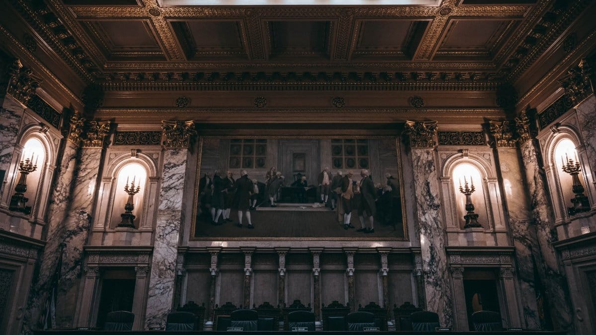Baroque architecture inside Wisconsin State Capitol in Madison, WI, featuring intricate design and historic artwork.