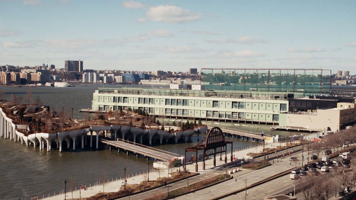 Aerial view of Pier 57 and surrounding area in New York City with the Hudson River in the background.