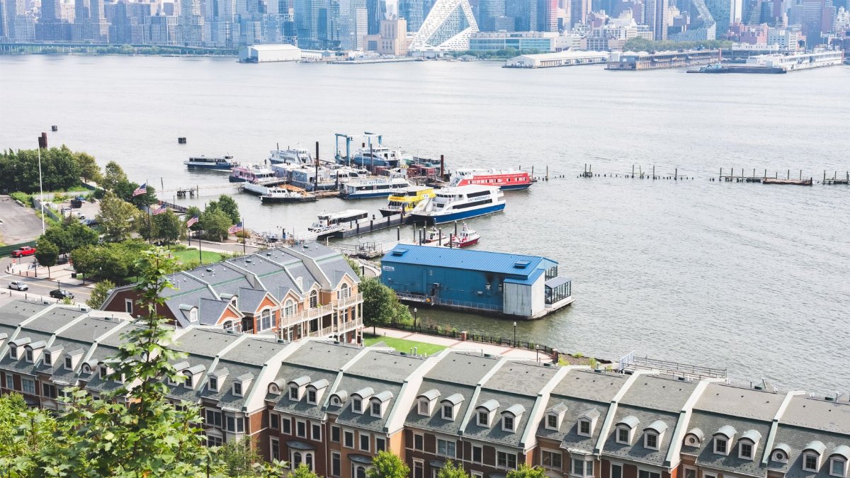 Aerial view of Edgewater, NJ overlooking the waterfront and Manhattan skyline.