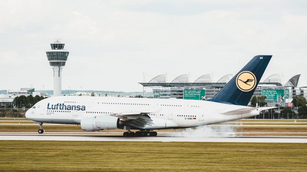 Lufthansa Airbus A380 landing at Munich Airport, showcasing aviation dynamics.