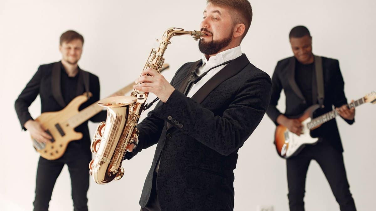 A lively jazz band playing different instruments on stage, creating a vibrant musical atmosphere.