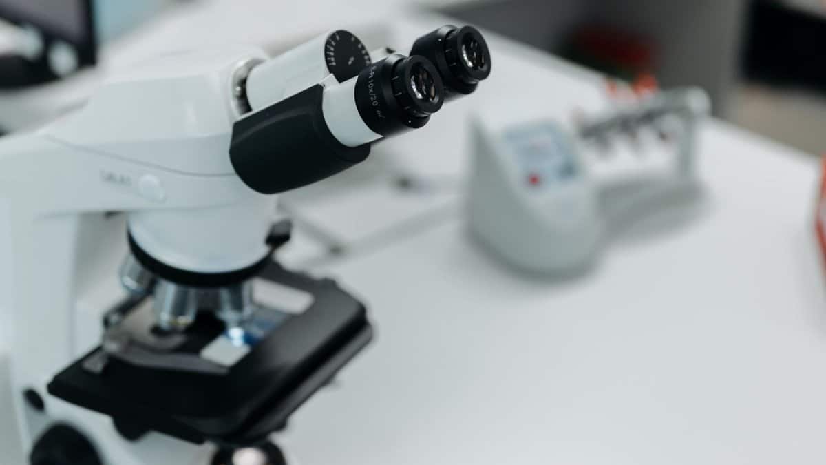 Detailed image of a microscope in a scientific laboratory environment.