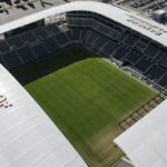 A panoramic aerial shot of the Banc of California Stadium, showcasing its modern architecture in Los Angeles, CA.