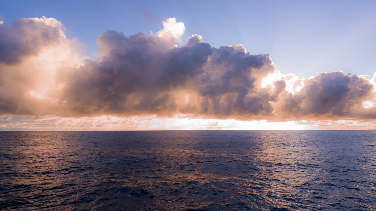 Captivating view of clouds over the Pacific Ocean at sunset in Hilo, Hawaii.