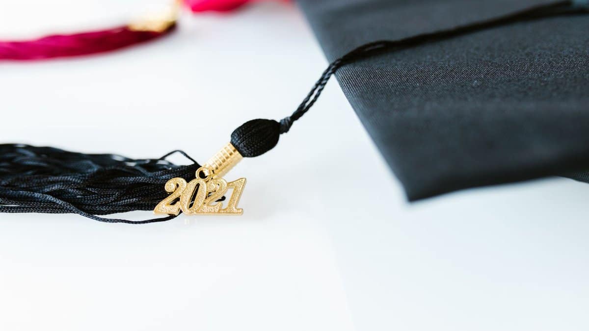 Close-up of a graduation cap with a 2021 tassel, symbolizing academic achievement.