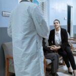 Doctors and patients in a hospital environment, fostering care and companionship.