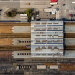 Aerial view capturing the bustling Skopje railway station in North Macedonia.