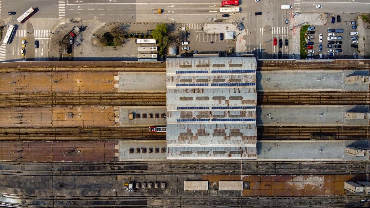 Aerial view capturing the bustling Skopje railway station in North Macedonia.