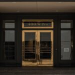 Entrance of MorningStar Oil and Gas at 400 W 7th, depicting a classic and formal architectural style.