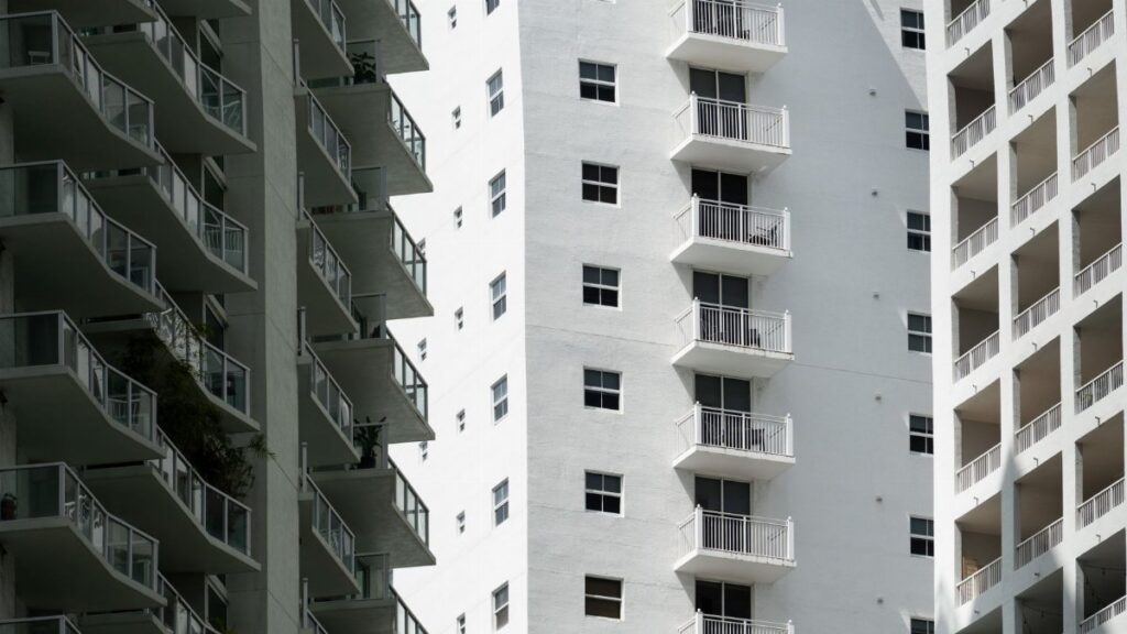 Close-up of modern high-rise apartment buildings with balconies in Miami, Florida.